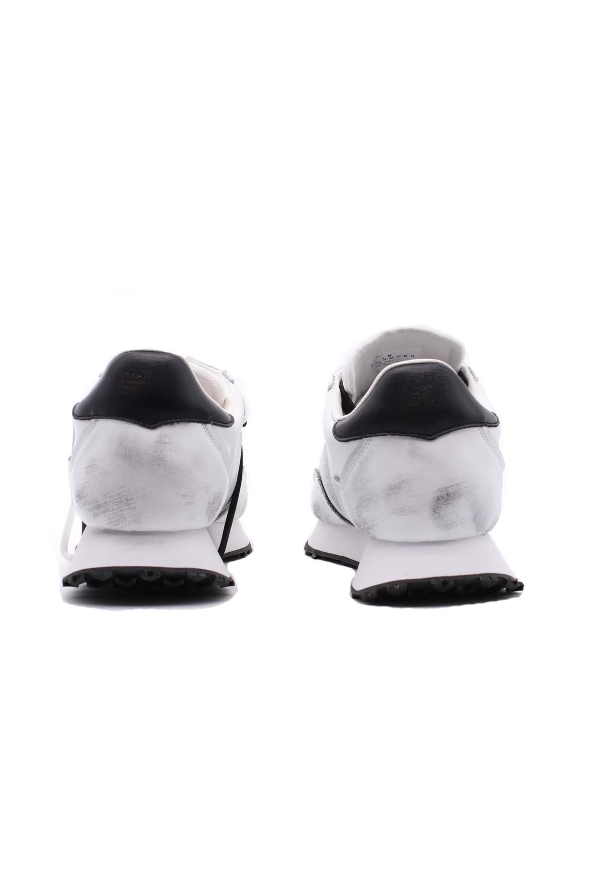 Sneaker in Nappa effetto used con Logo Lettering