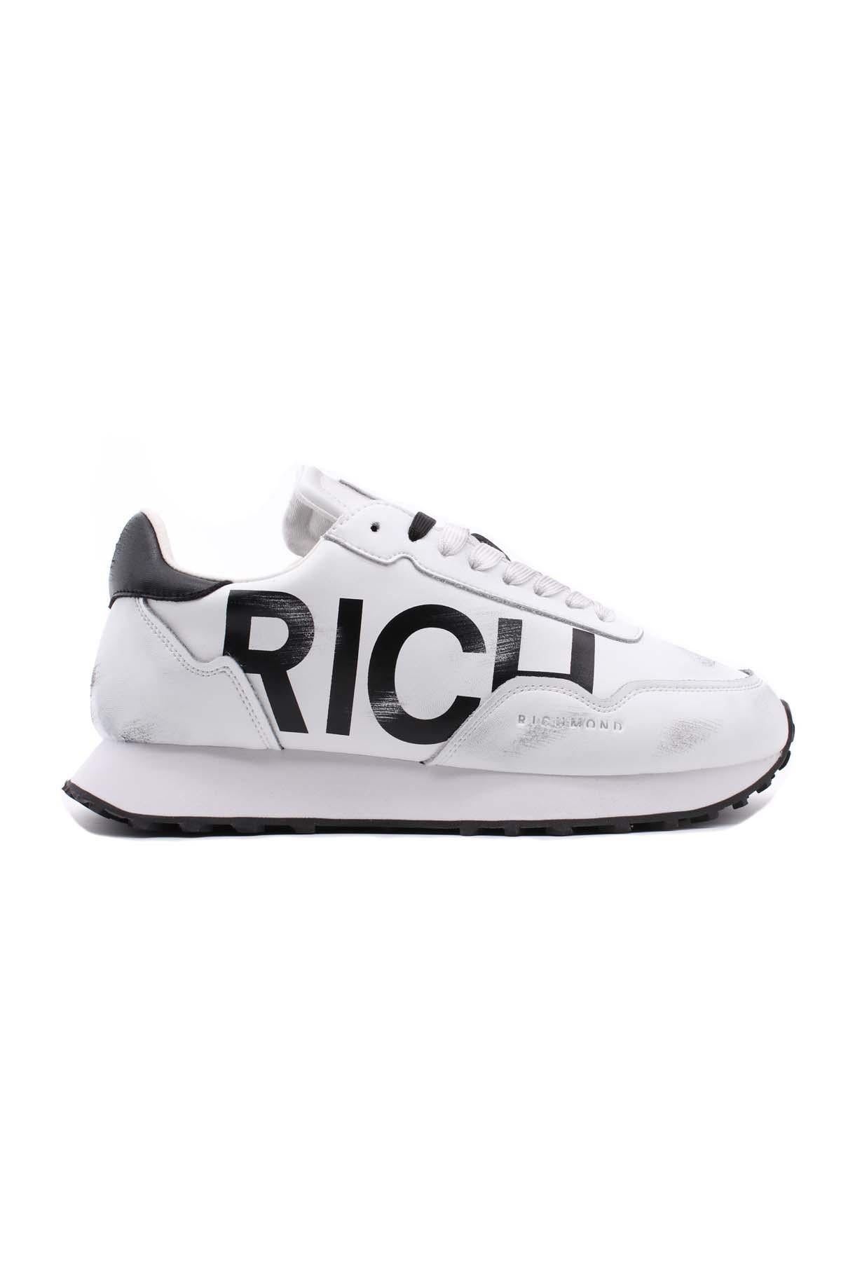 Sneaker in Nappa effetto used con Logo Lettering