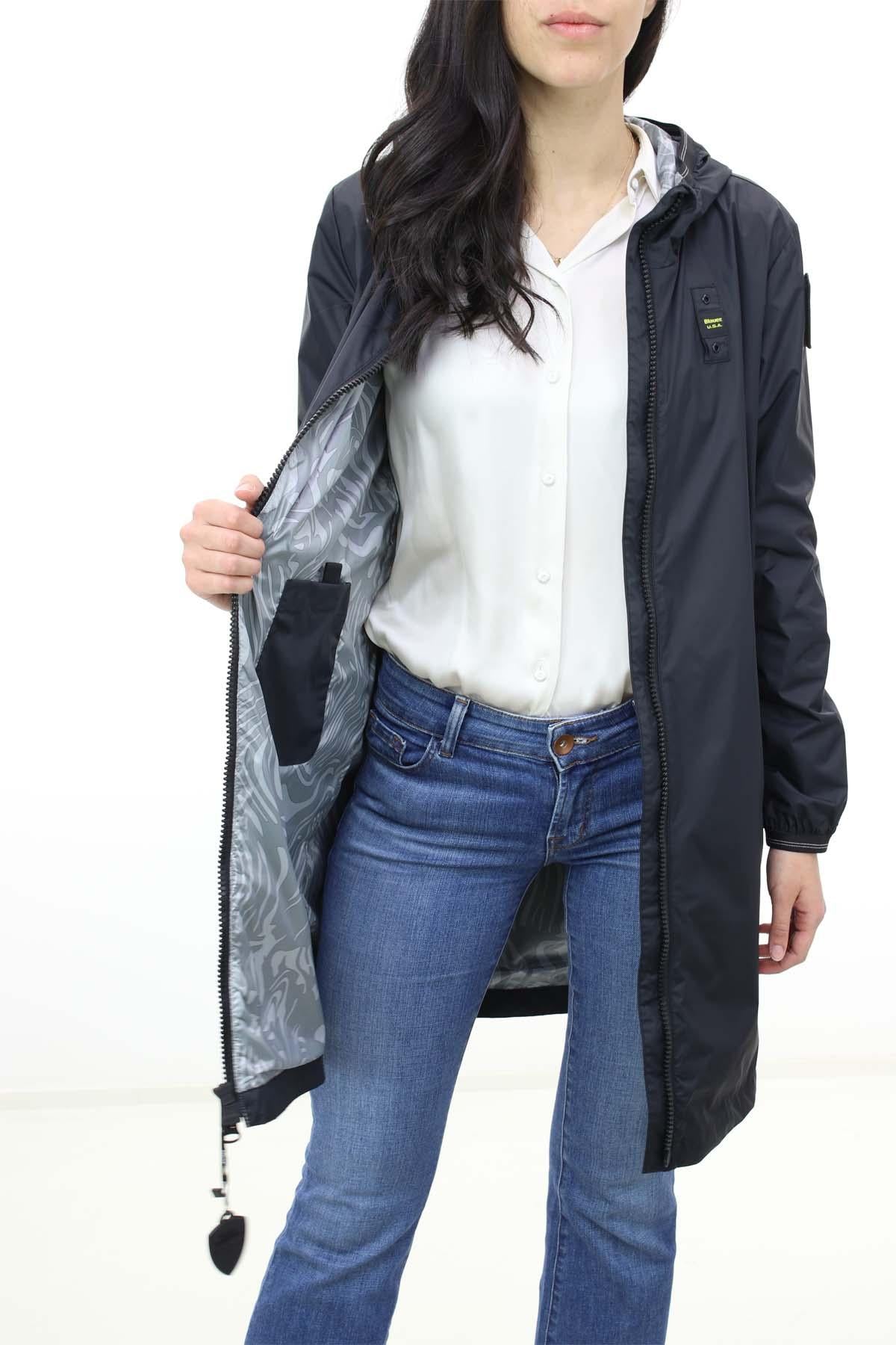 Trench impermeabile con cappuccio