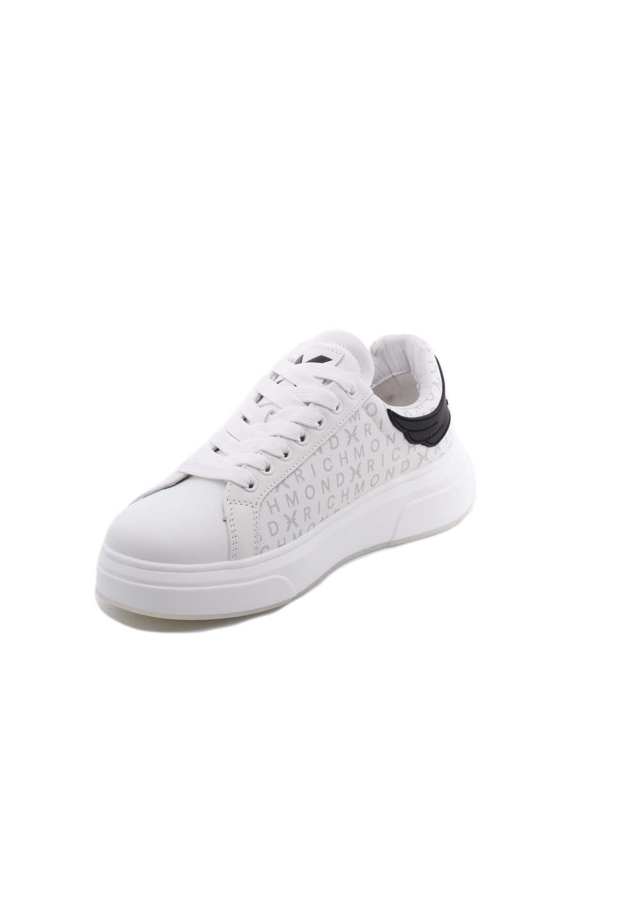 Sneaker in pelle con monogramma John Richmond