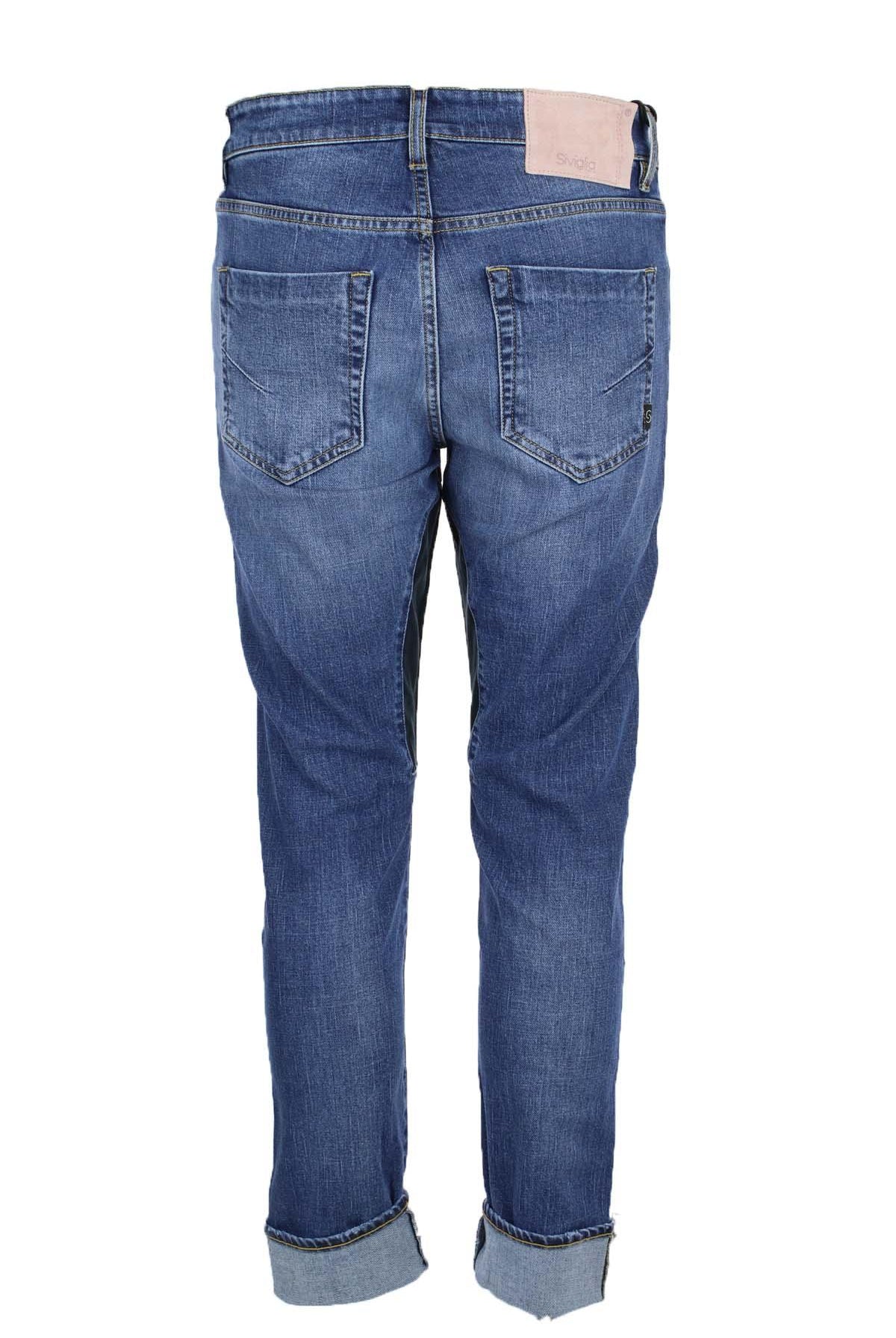 Jeans denim 5 tasche con toppa in alcantara