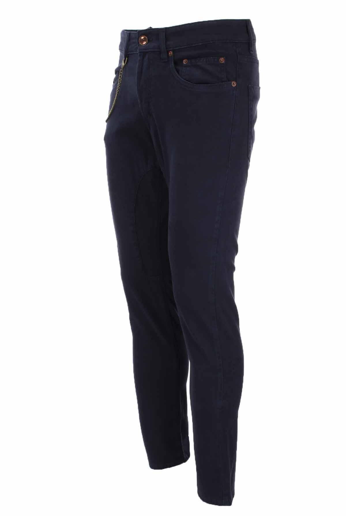 Pantalone 5 tasche in cotone con toppa