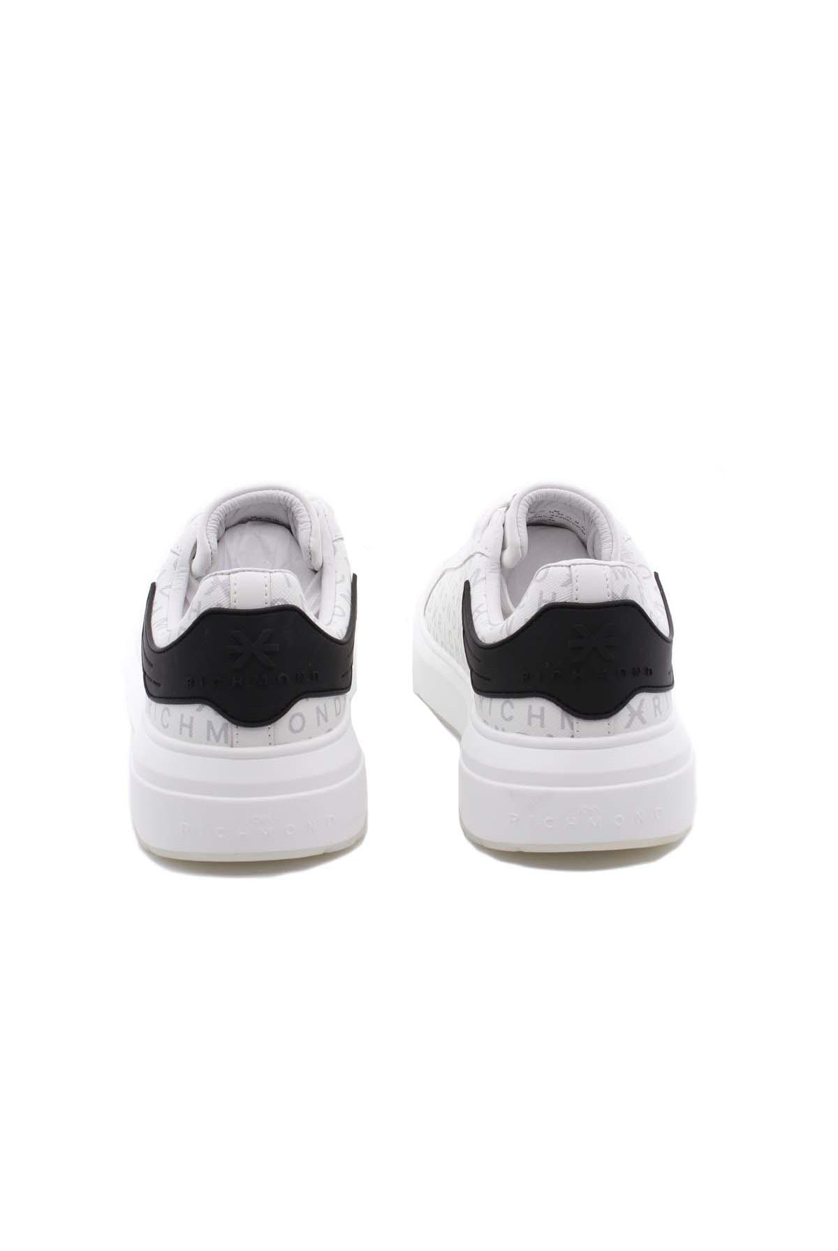 Sneaker in pelle con monogramma John Richmond