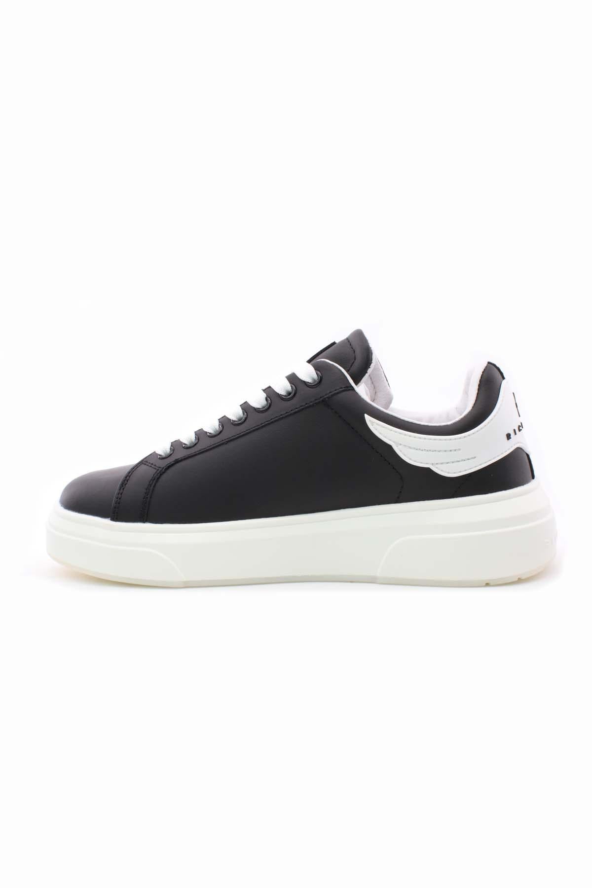 Sneaker in pelle liscia con logo