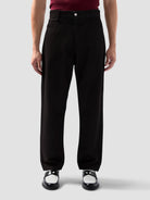Pantalone jeans 5 tasche in denim trattato 