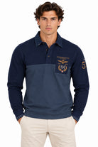 Polo manica lunga in piquet con patch e ricami 