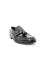Mocassini in vernice con nappine 