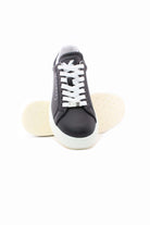 Sneaker in pelle liscia con logo 