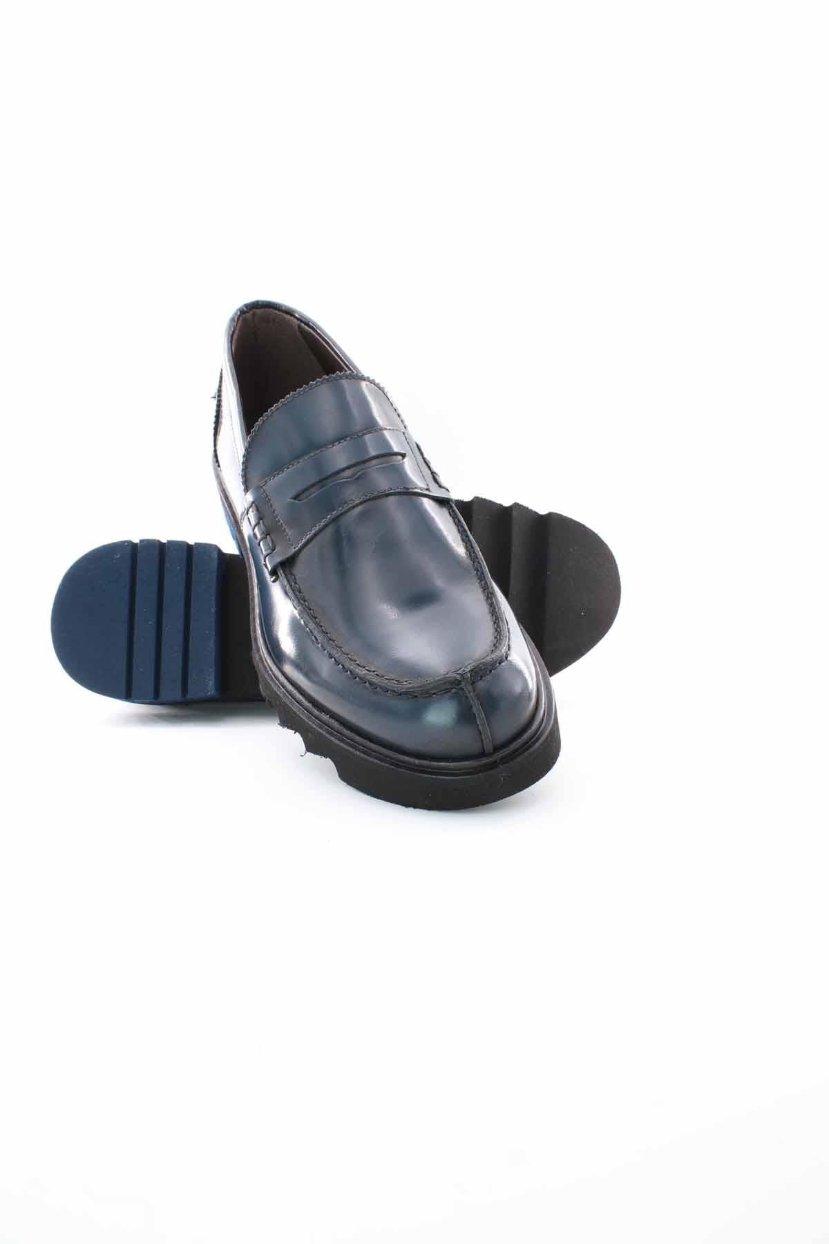 Mocassino in pelle suola in gomma carro armato 