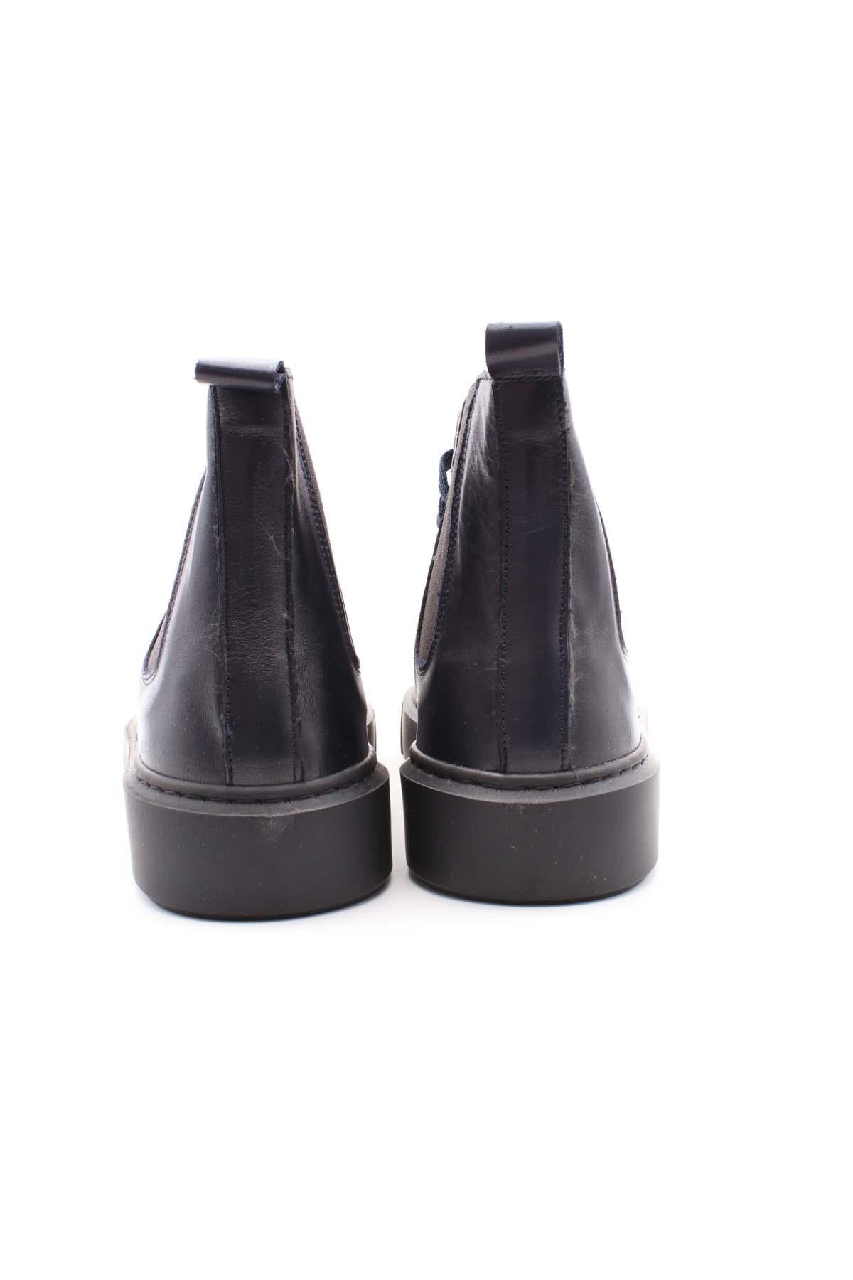 Scarpe stringate alte in pelle 
