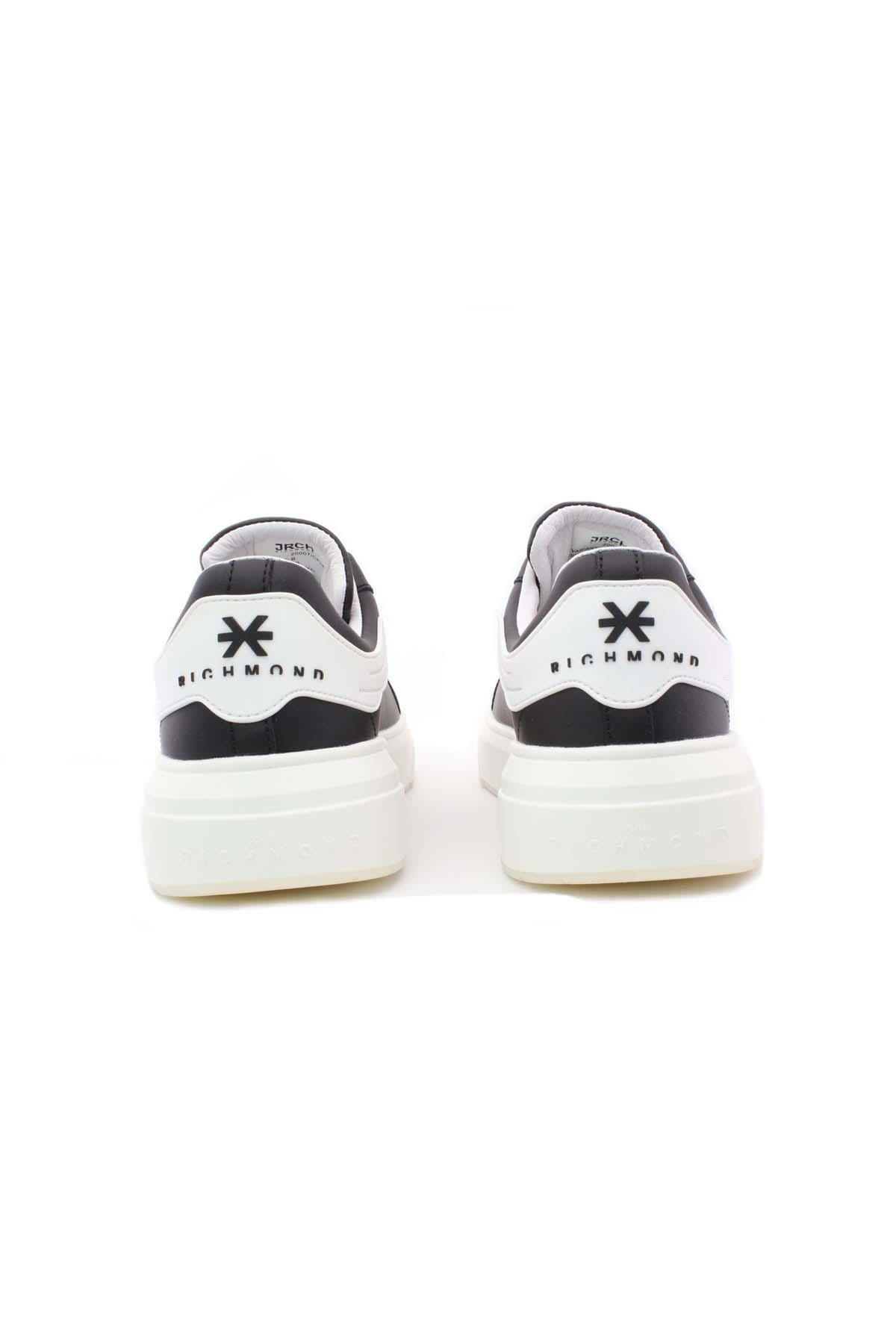 Sneaker in pelle liscia con logo 