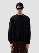 Felpa girocollo con logo in tinta effetto used 