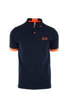 Polo mezza manica con dettagli e logo fluo 
