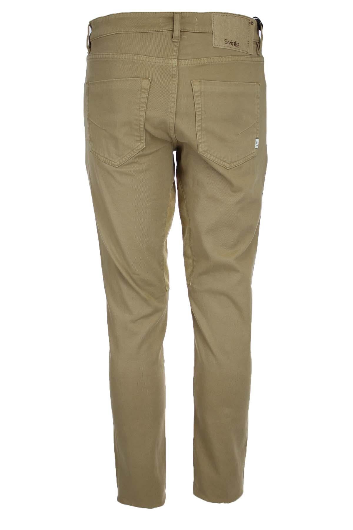 Pantalone 5 tasche in cotone con toppa in alcantara 