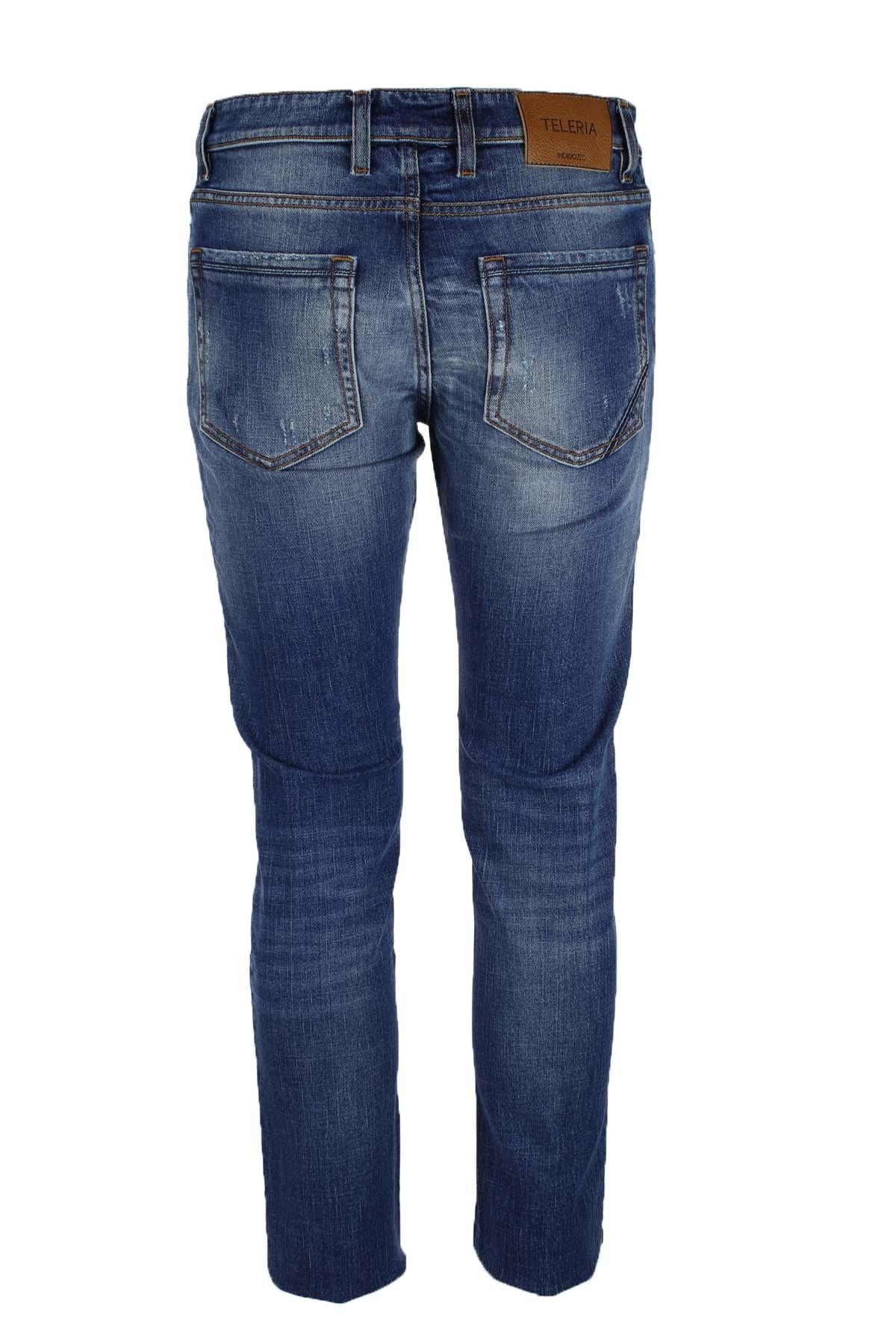 Jeans denim 5 tasche con rotture 
