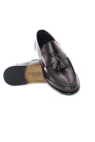 Mocassini in pelle con nappine 