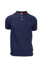 Polo mezza manica tinta unita con logo 