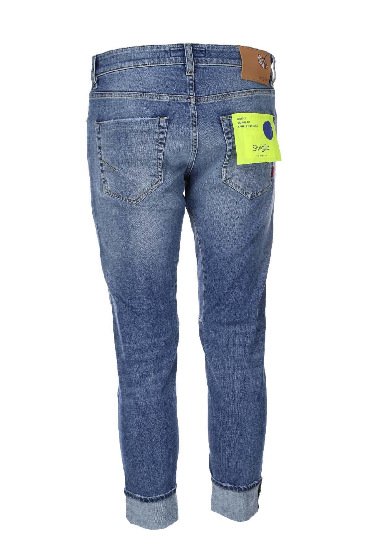 Jeans denim 5 tasche con toppe 