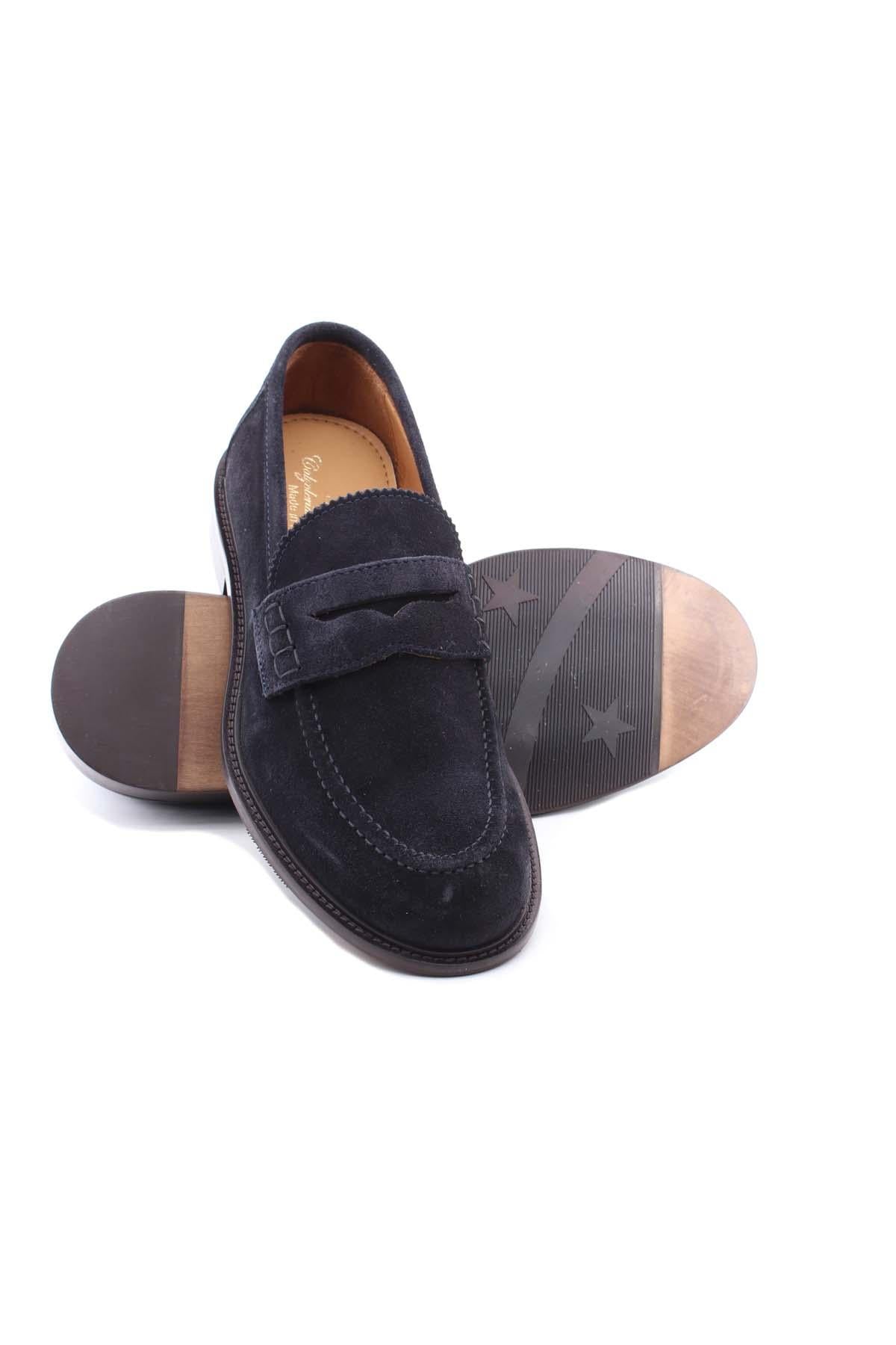 Mocassini in camoscio con fondo cuoio e gomma 