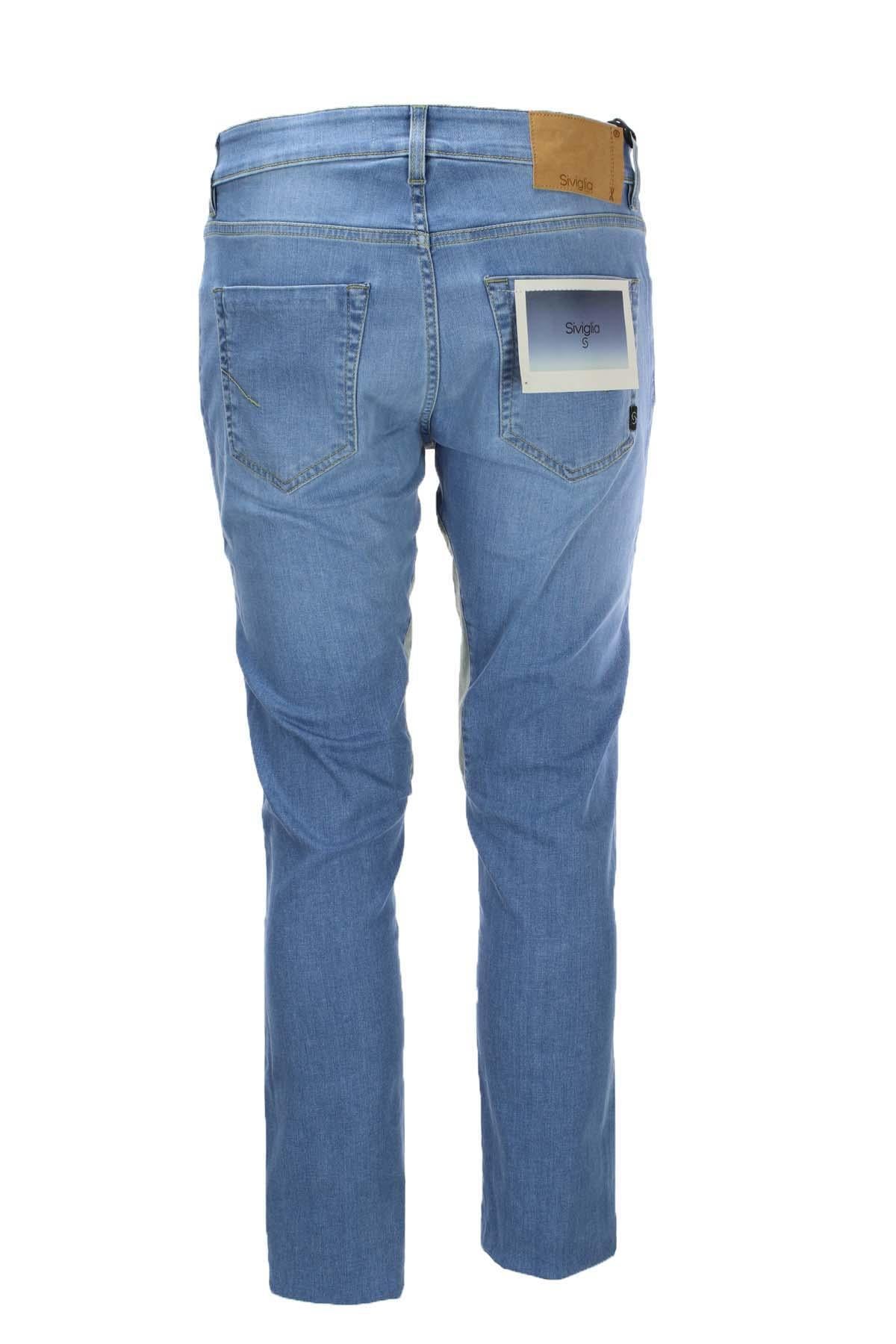 Jeans denim 5 tasche con toppe in alcantara 