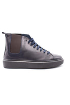 Scarpe stringate alte in pelle 