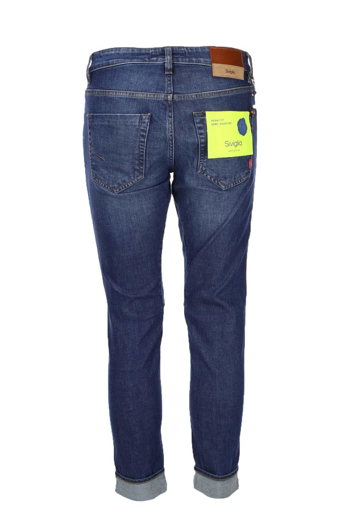 Jeans denim 5 tasche con toppe in tinta 