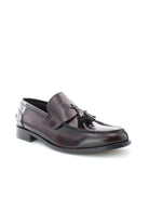 Mocassini in pelle con nappine 