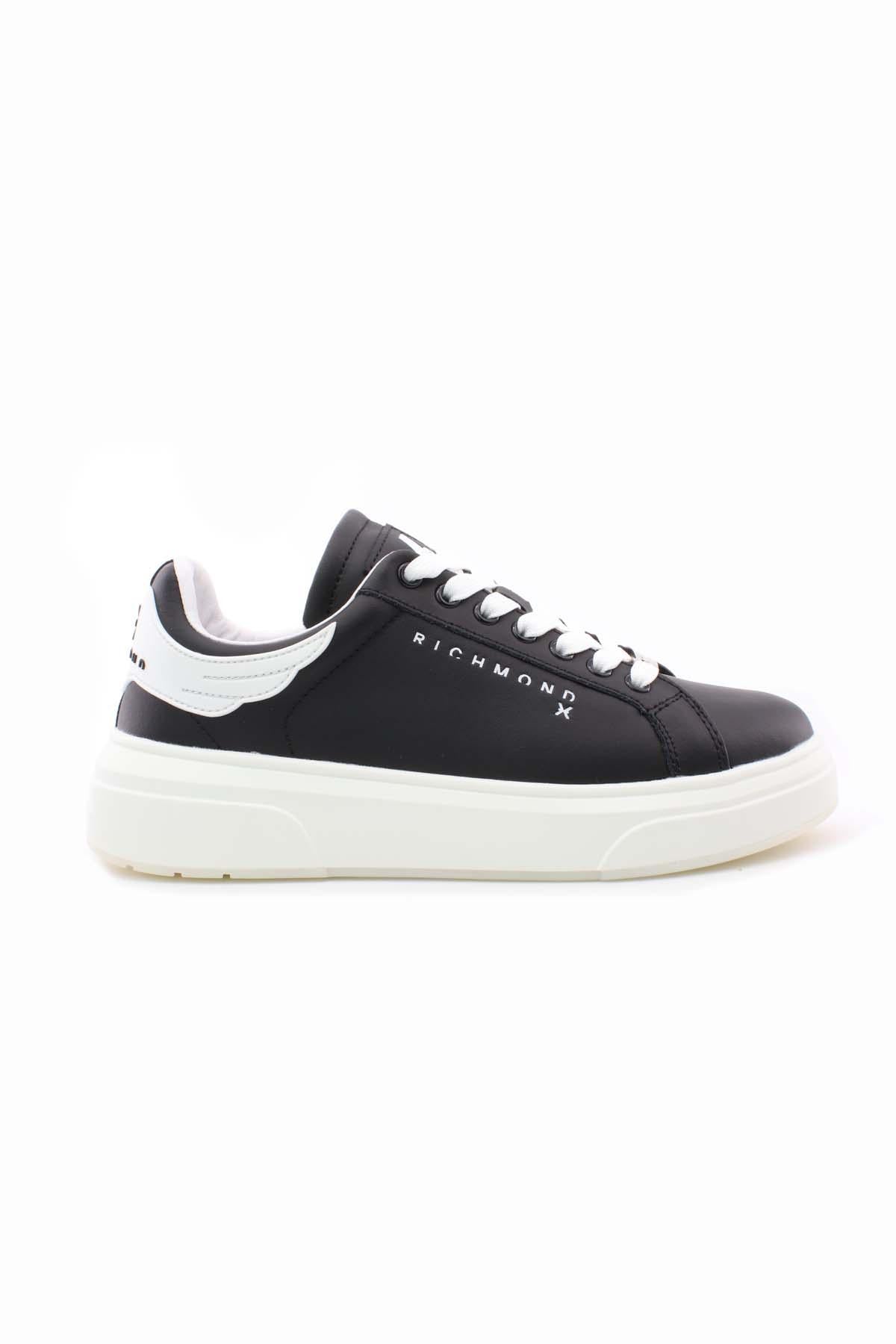 Sneaker in pelle liscia con logo 