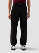 Pantalone jeans 5 tasche in denim trattato 